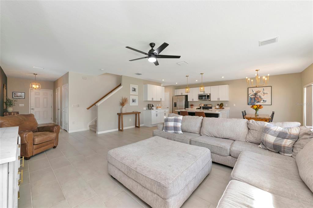 6283 Springmont Loop Palmetto, FL 34221 - Photo 11 of 68 a living room with furniture and white walls