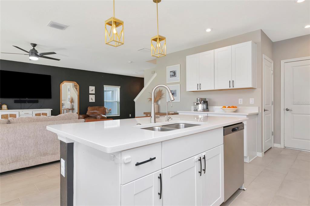6283 Springmont Loop Palmetto, FL 34221 - Photo 19 of 68 a kitchen with a sink and a refrigerator