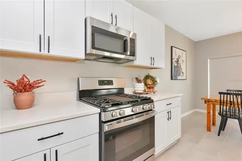 a view of a livingroom with a staircase