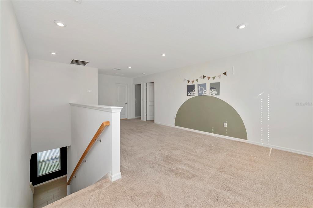 6283 Springmont Loop Palmetto, FL 34221 - Photo 24 of 68 a view of a livingroom with a staircase