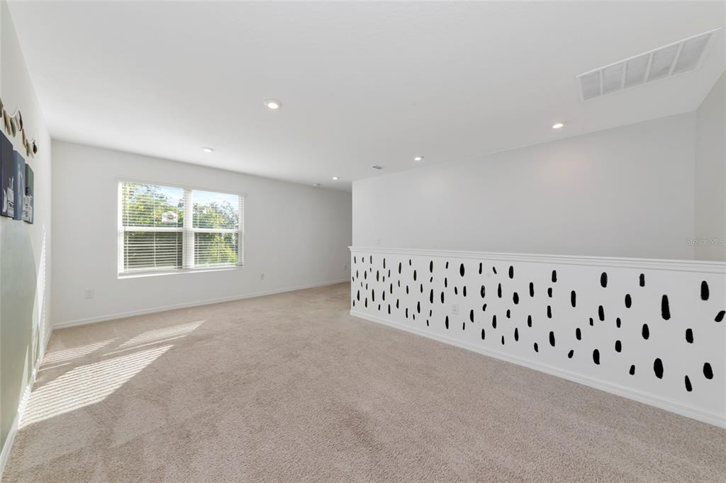 6283 Springmont Loop Palmetto, FL 34221 - Photo 25 of 68 a view of an empty room with a window