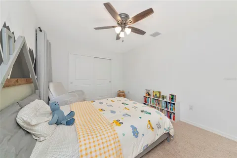 an aerial view of a house with yard swimming pool and outdoor seating