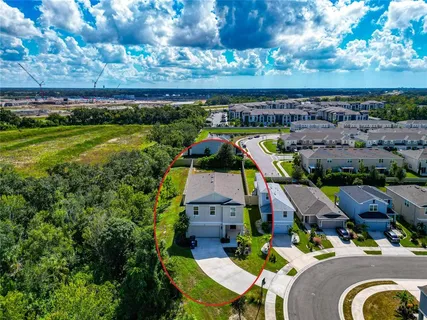 a view of a chairs and tables in patio