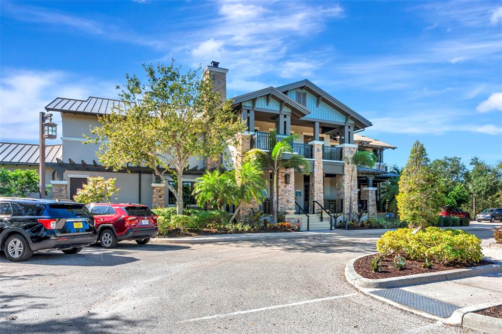 6283 Springmont Loop Palmetto, FL 34221 - Photo 53 of 68 a front view of a house with a yard
