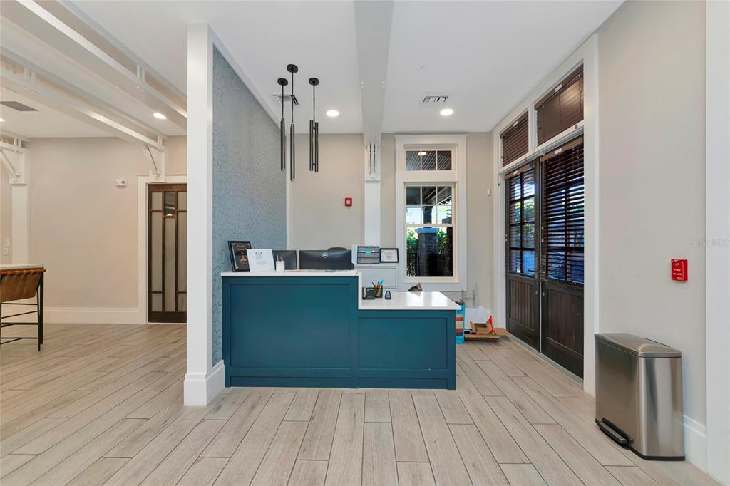 6283 Springmont Loop Palmetto, FL 34221 - Photo 54 of 68 a living room with stainless steel appliances kitchen island wooden floors and living room view