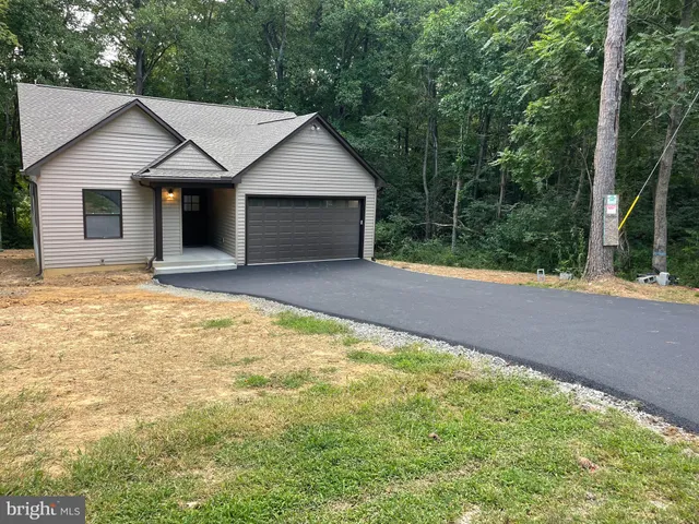 a view of backyard of house