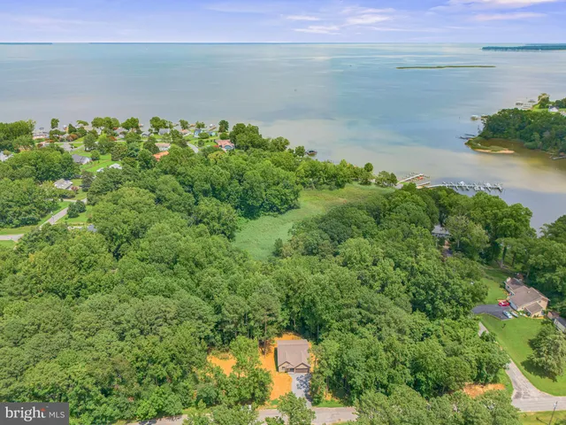 a view of a lake with a yard