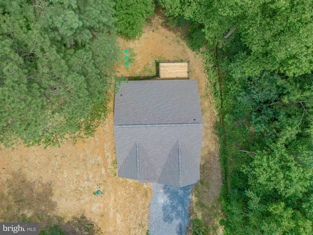 a house view with a backyard space