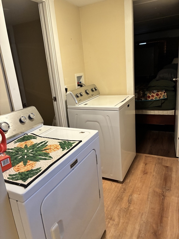 559 Tea Street, Unit 1 Charlemont, MA 01339 - Photo 10 of 14 a kitchen with a stove and a microwave