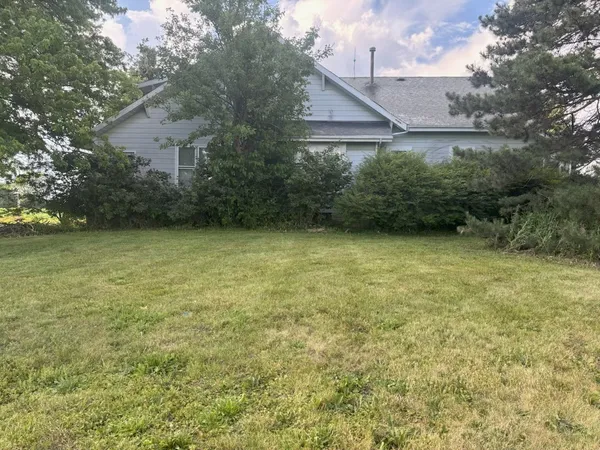 a view of a yard with an outdoor space