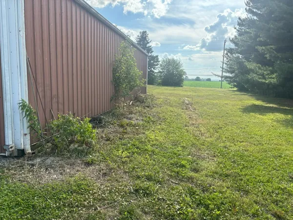 a view of a garden with a fountain
