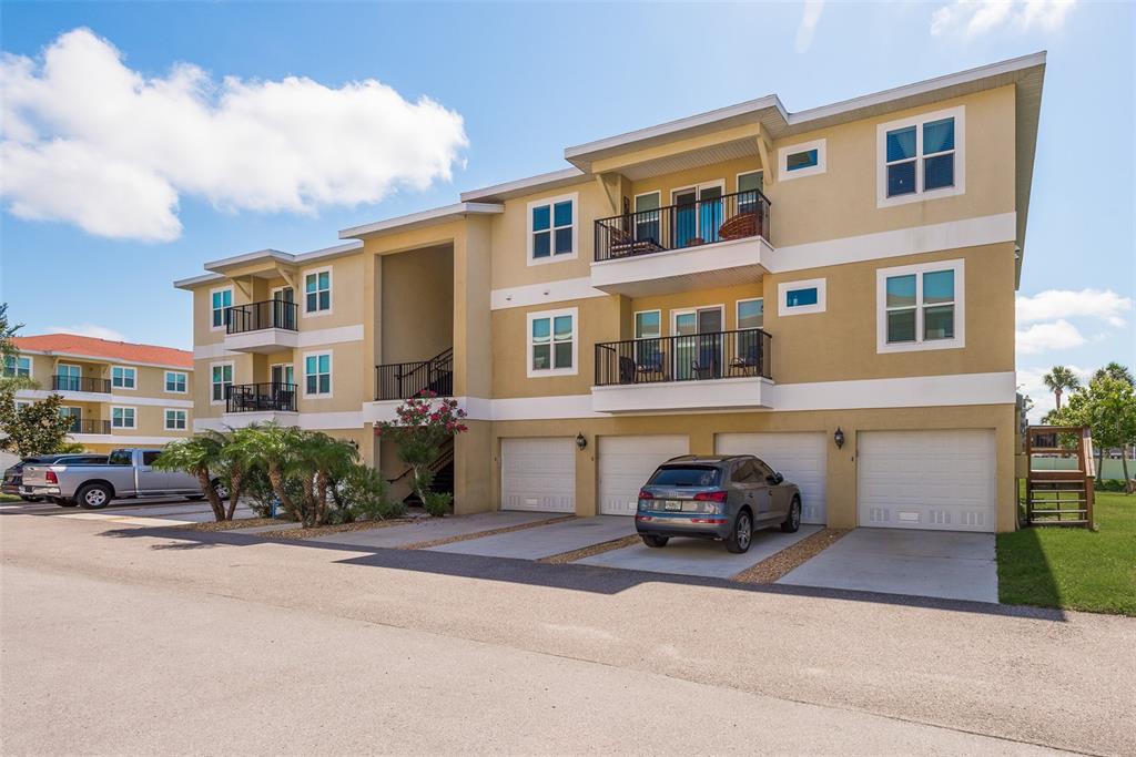 6420 Banyan Boulevard, Unit 304 New Port Richey, FL 34652 - Photo 1 of 1 a car parked in front of a building
