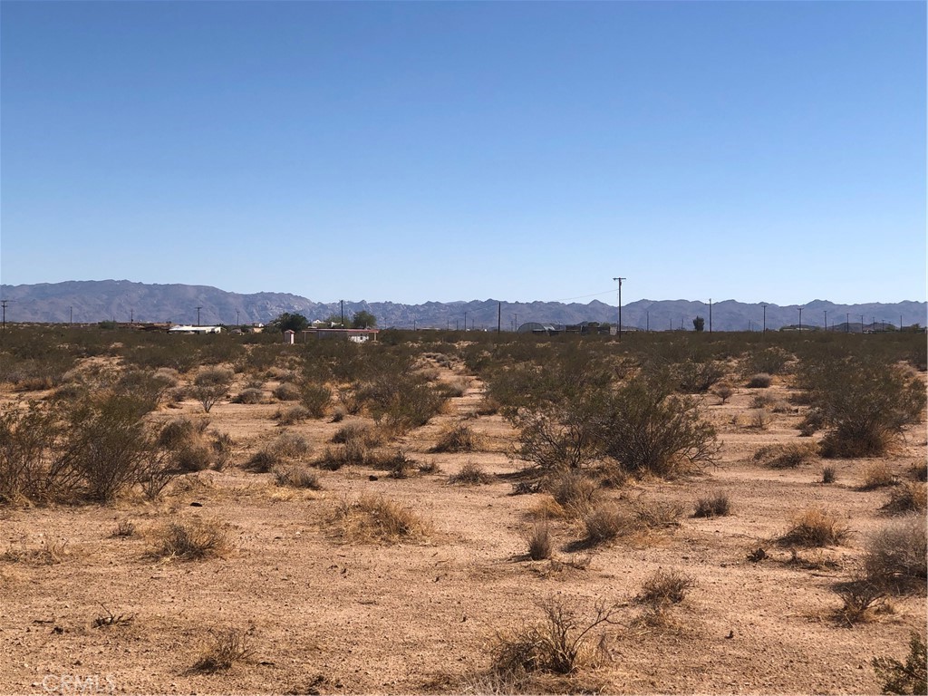 0 Near Daisy Lane Joshua Tree, CA 92252 - Photo 2 of 4 a view of lake with mountain