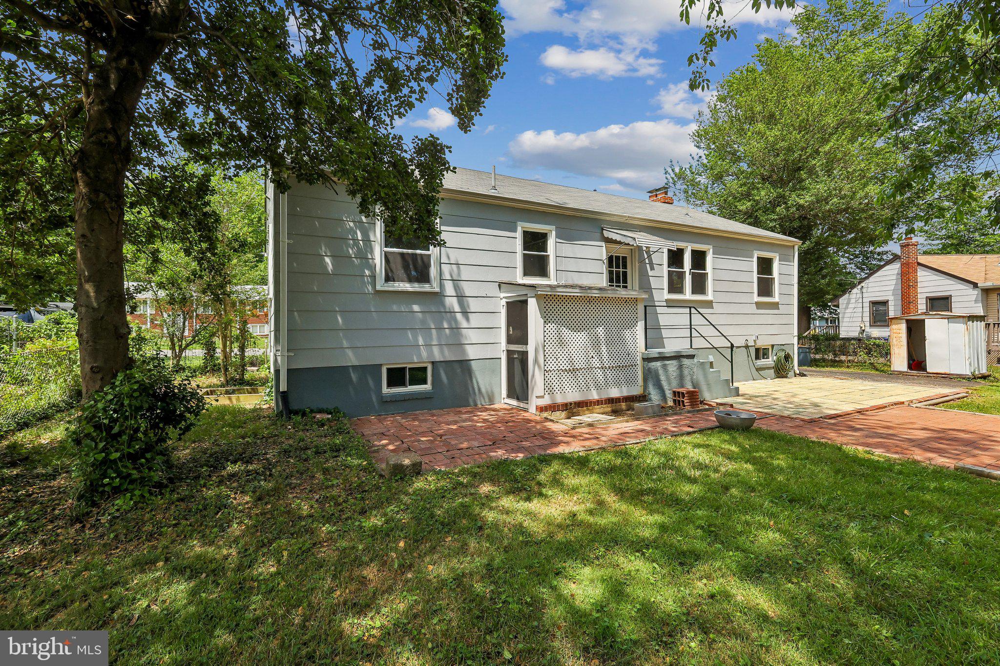10217 Rodgers Road Fairfax, VA 22030 - Photo 25 of 27 Walkout from the main/ lower level to the backyard