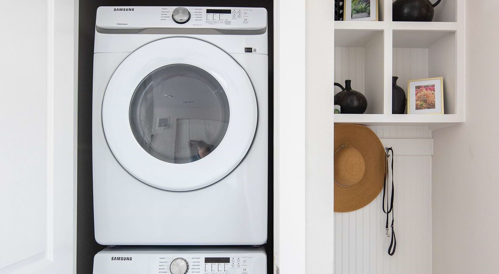 2425 Bell Street, Unit 2209 Houston, TX 77003 - Photo 11 of 30 a close up view of a washer and dryer