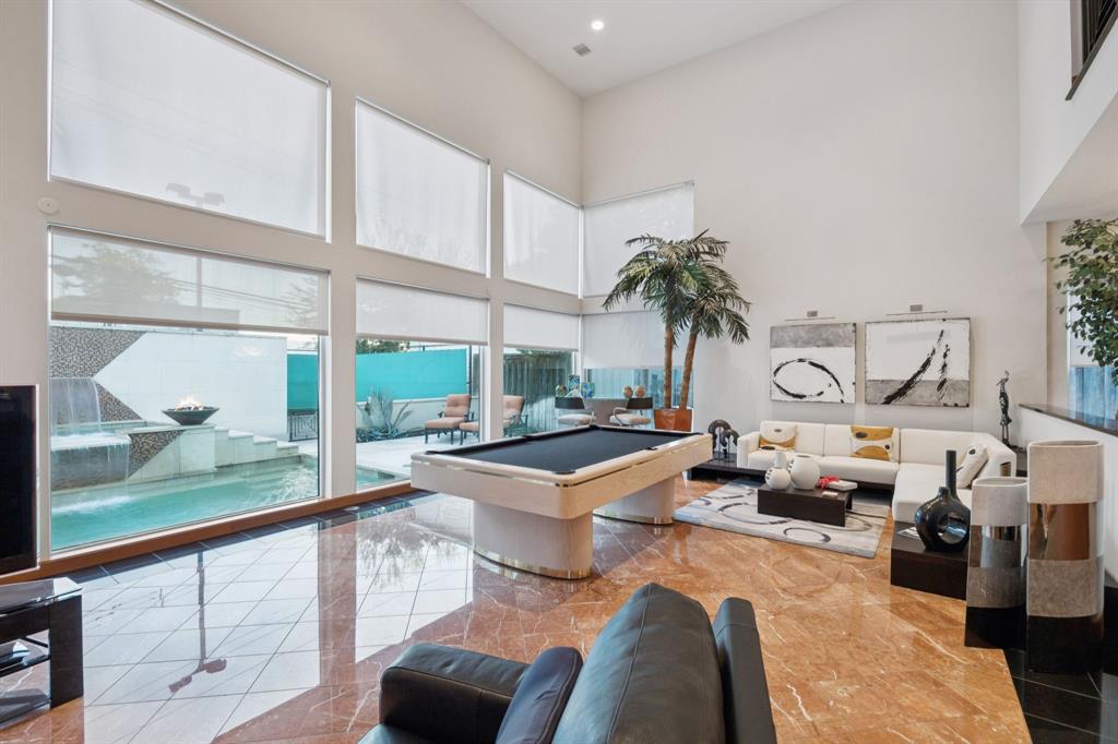 5730 West Amherst Avenue Dallas, TX 75209 - Photo 19 of 40 a living room with furniture and a large window