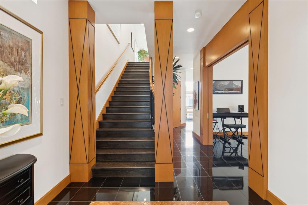 5730 West Amherst Avenue Dallas, TX 75209 - Photo 2 of 40 a view of entryway and hall with wooden floor