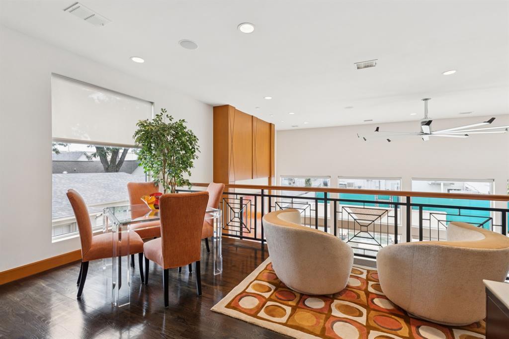 5730 West Amherst Avenue Dallas, TX 75209 - Photo 22 of 40 a dining room with furniture window and wooden floor