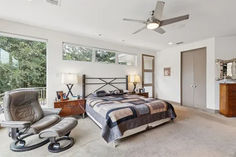 a kitchen with stainless steel appliances a sink and cabinets