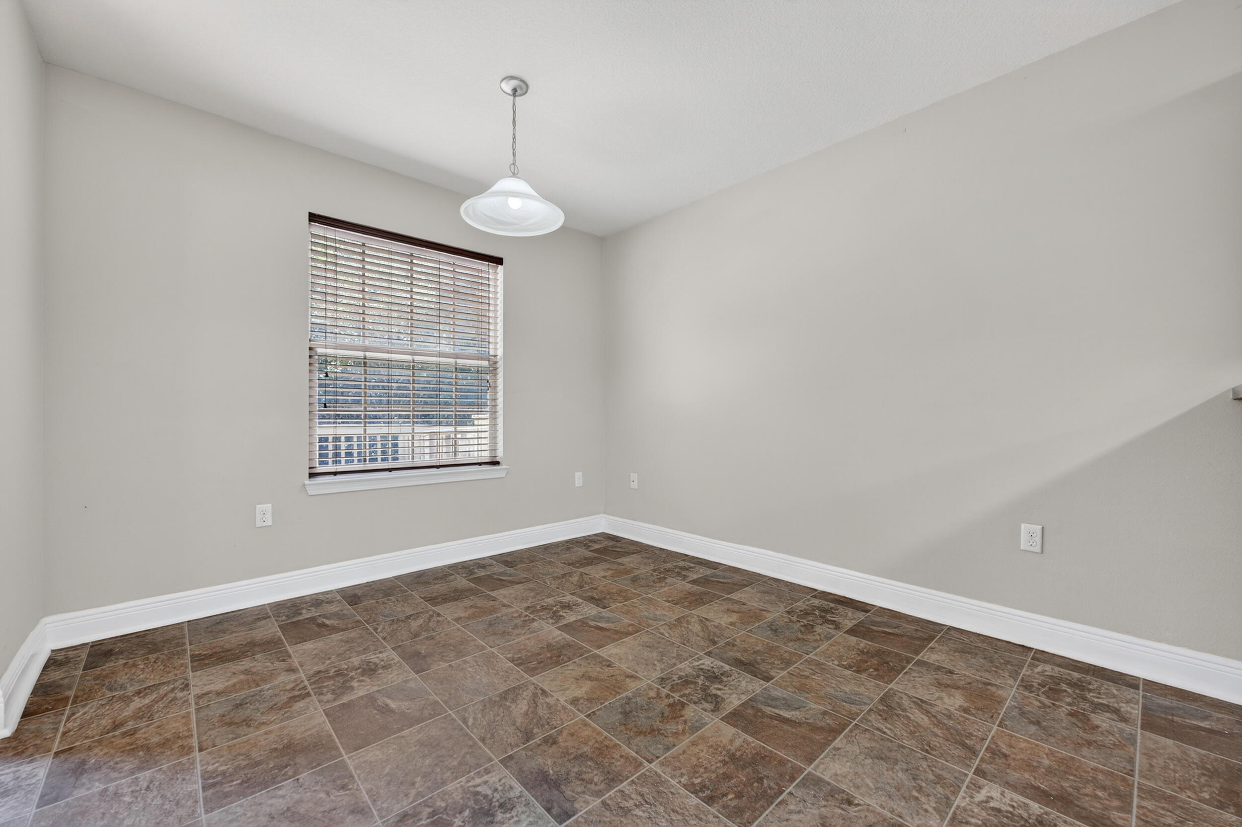 313 Gauntlet Drive Crestview, FL 32539 - Photo 11 of 44 en empty room with windows