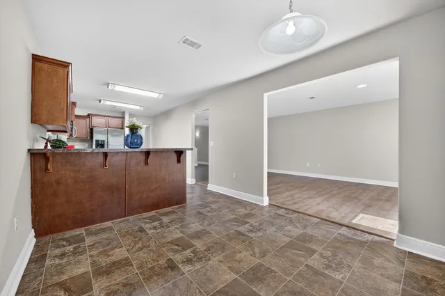 a view of kitchen and living room