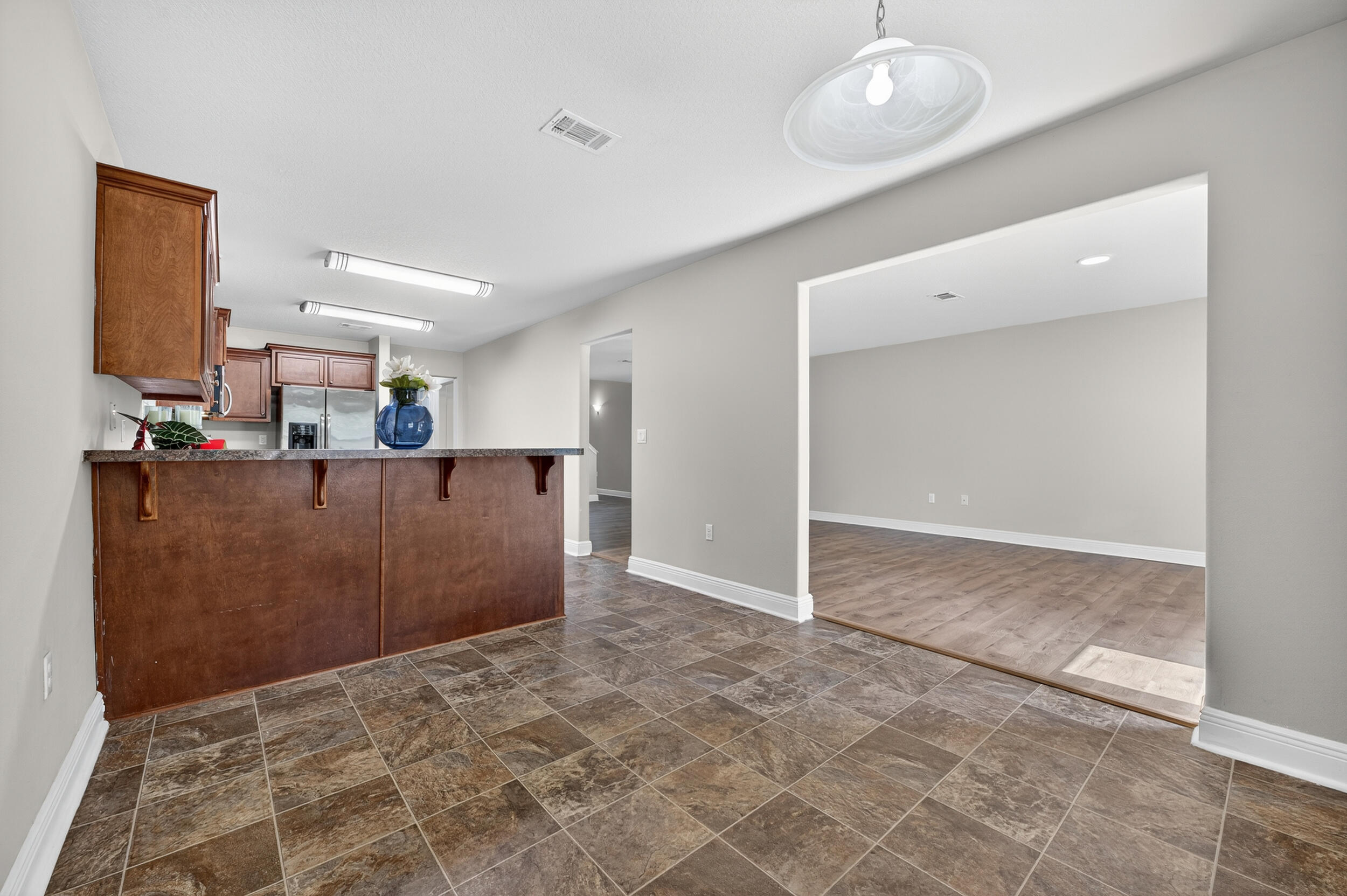 313 Gauntlet Drive Crestview, FL 32539 - Photo 13 of 44 a view of kitchen and living room