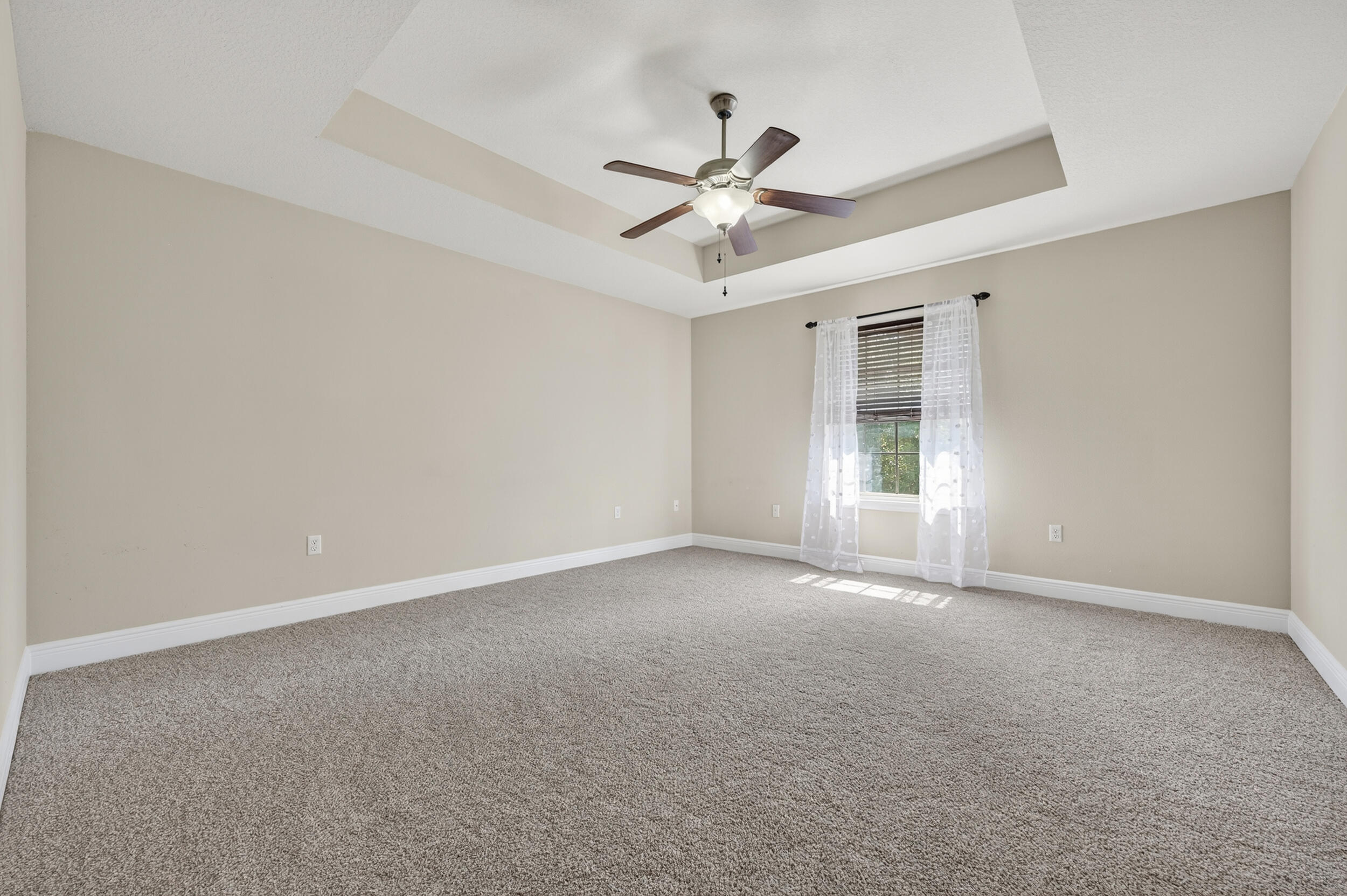 313 Gauntlet Drive Crestview, FL 32539 - Photo 24 of 44 a view of an empty room with a window