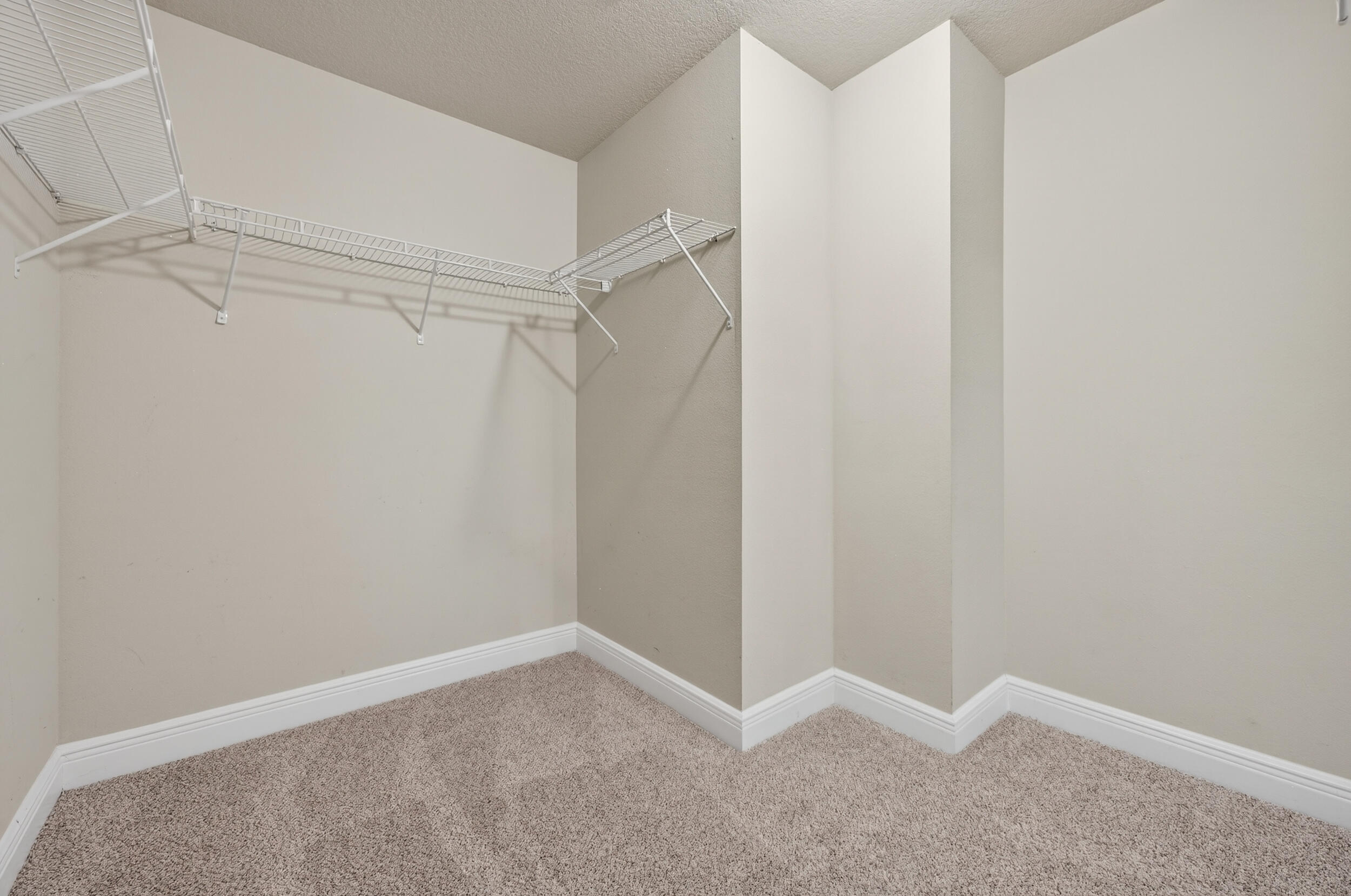 313 Gauntlet Drive Crestview, FL 32539 - Photo 30 of 44 a view of an empty walk in closet