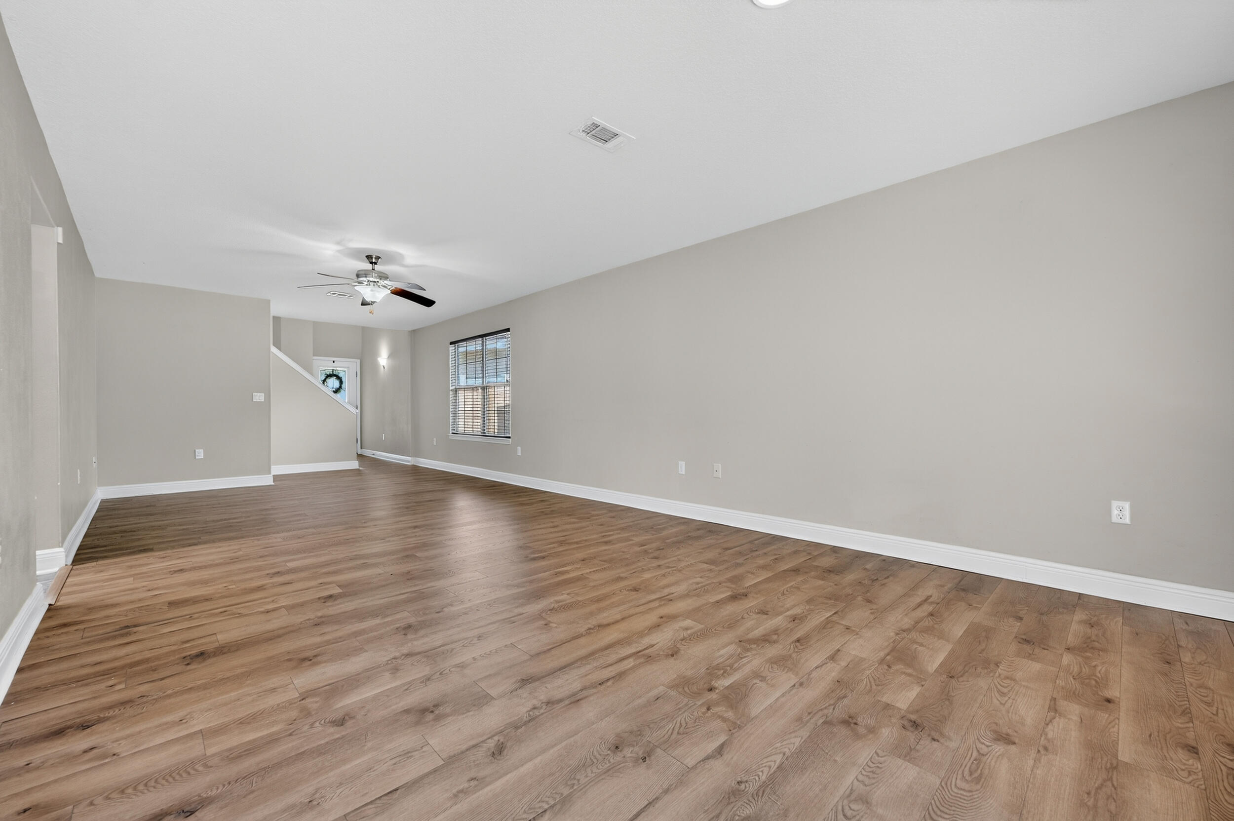 313 Gauntlet Drive Crestview, FL 32539 - Photo 6 of 44 wooden floor in an empty room
