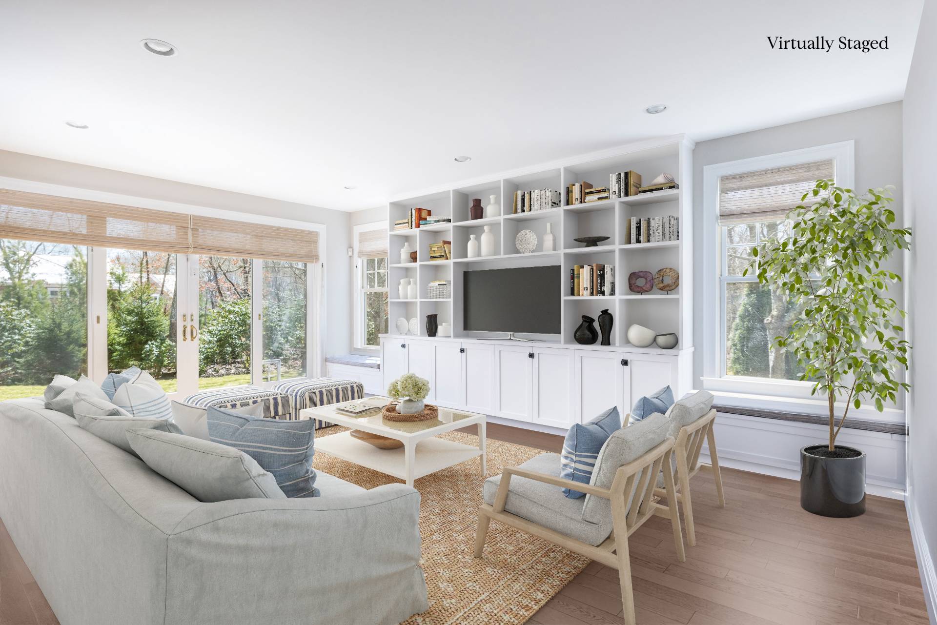 9 Dering Lane East Hampton, NY 11937 - Photo 12 of 30 a living room with furniture and a flat screen tv