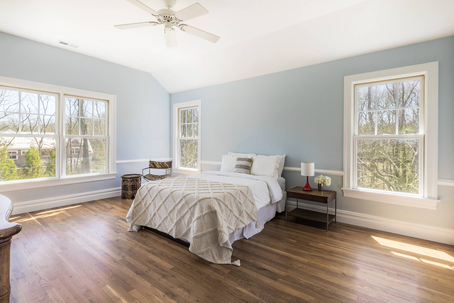 9 Dering Lane East Hampton, NY 11937 - Photo 19 of 30 a spacious bedroom with a bed and a large window