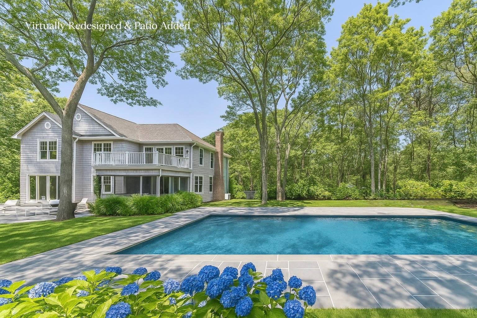 9 Dering Lane East Hampton, NY 11937 - Photo 2 of 30 a front view of a house with a yard