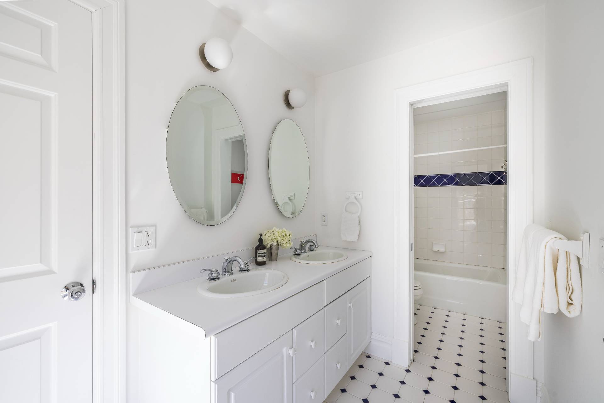 9 Dering Lane East Hampton, NY 11937 - Photo 21 of 30 a bathroom with a sink a mirror and shower