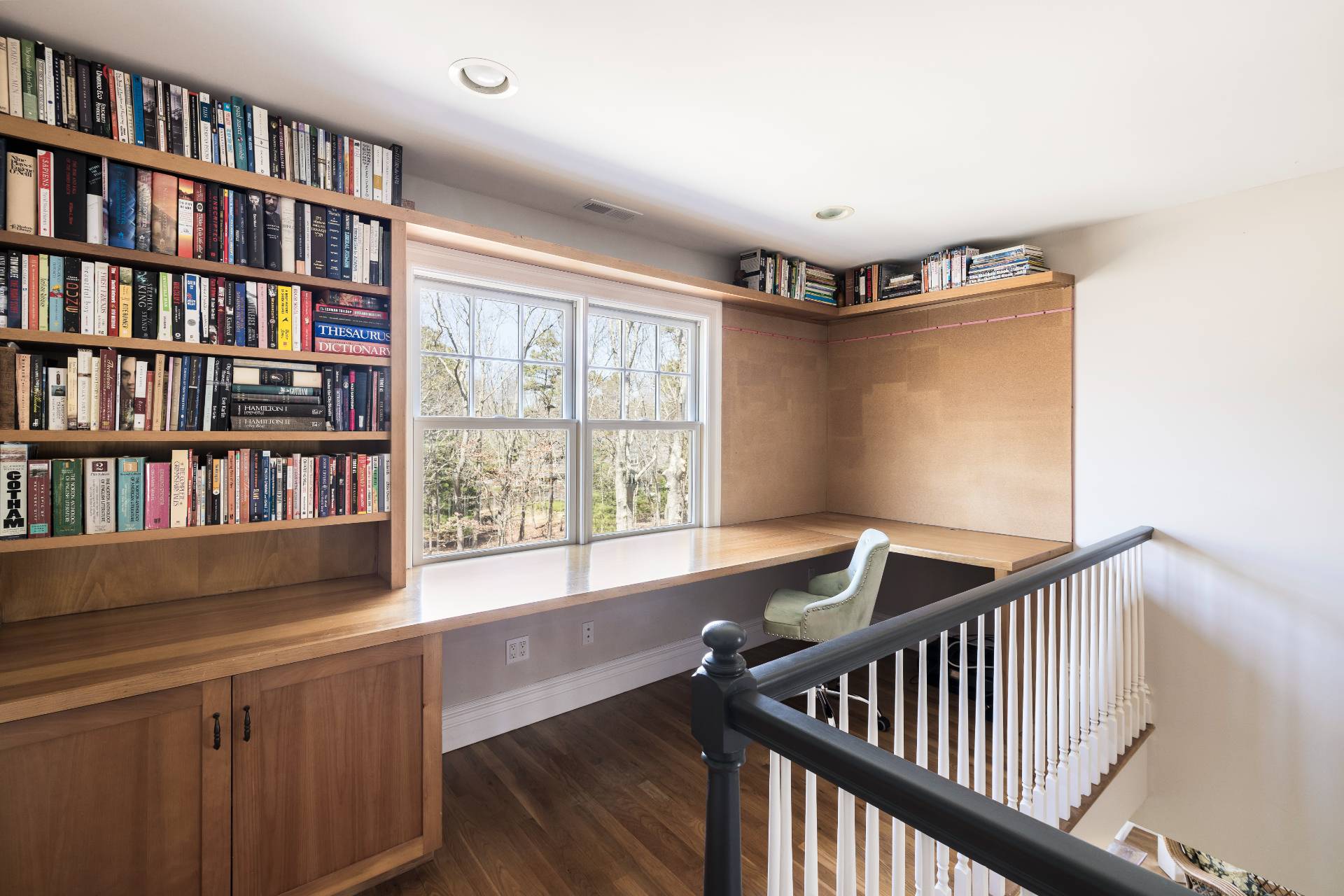 9 Dering Lane East Hampton, NY 11937 - Photo 23 of 30 a view of livingroom with furniture and book shelf