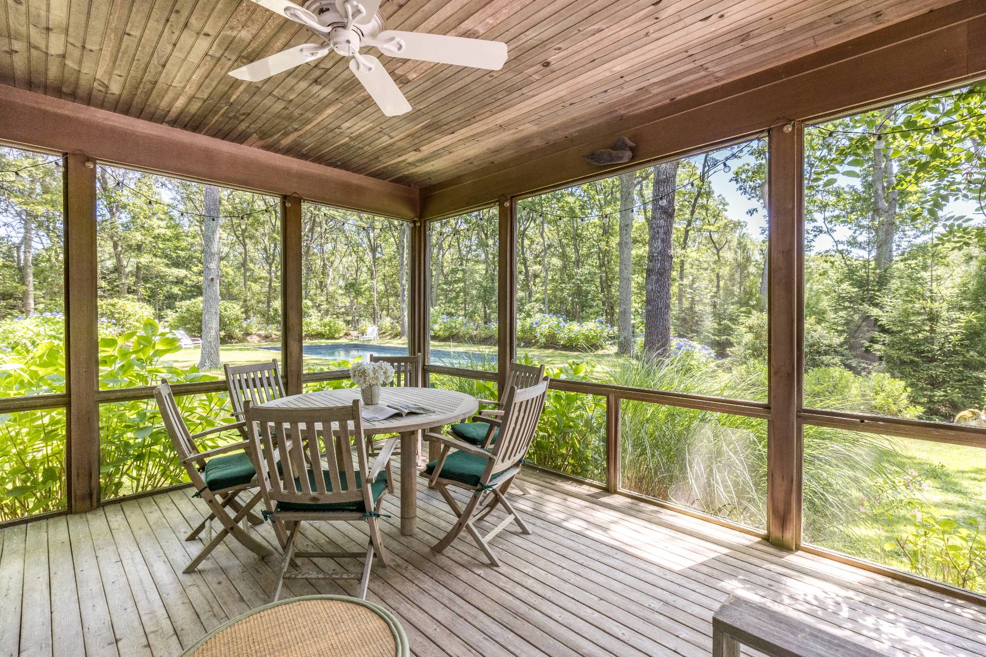 9 Dering Lane East Hampton, NY 11937 - Photo 27 of 30 a dining room with furniture window and wooden floor
