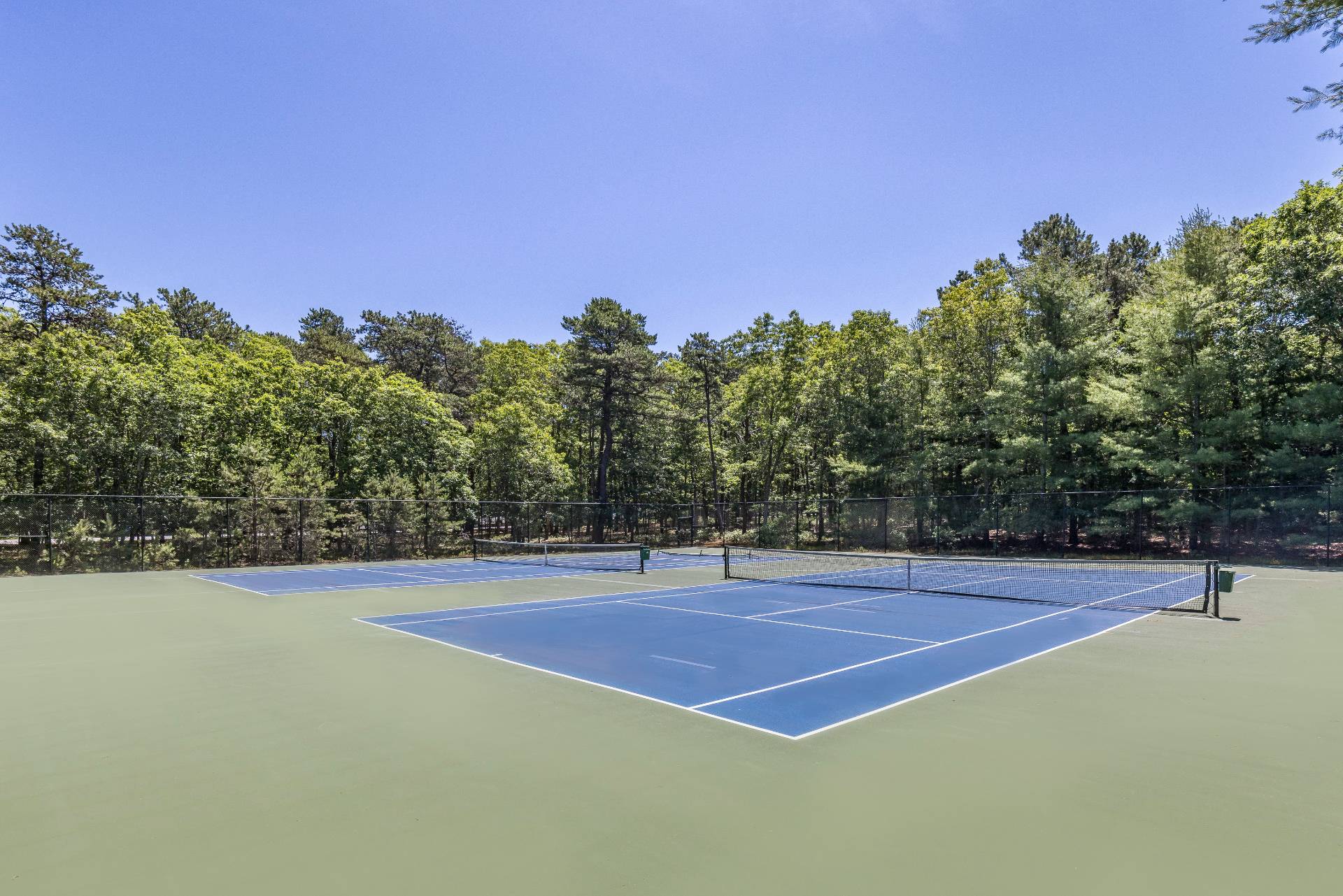 9 Dering Lane East Hampton, NY 11937 - Photo 30 of 30 a view of a tennis court