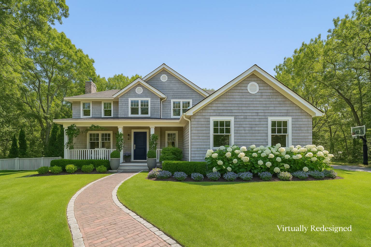 9 Dering Lane East Hampton, NY 11937 - Photo 4 of 30 a front view of a house with a garden