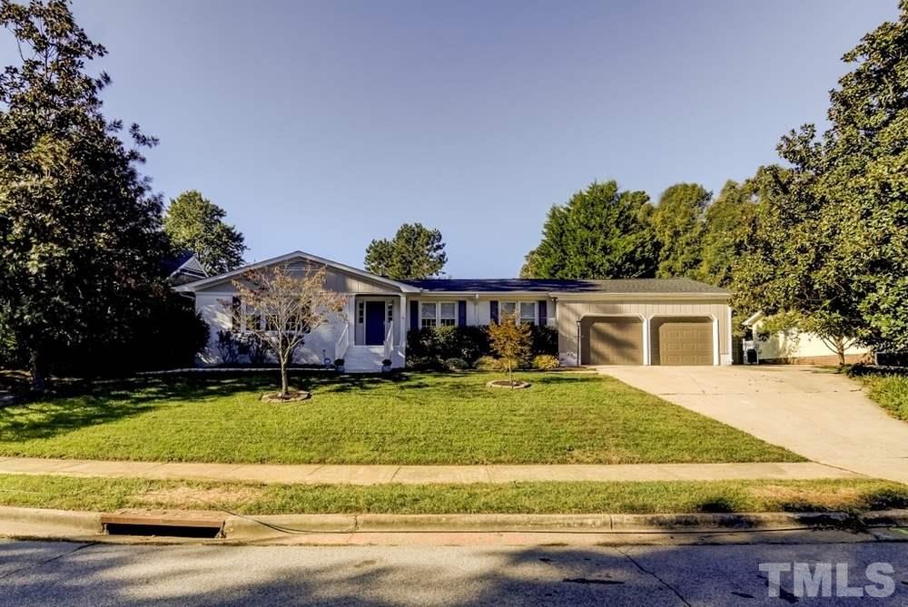 3005 Old Orchard Road Raleigh, NC 27607 - Photo 2 of 21 front view of a house with a yard