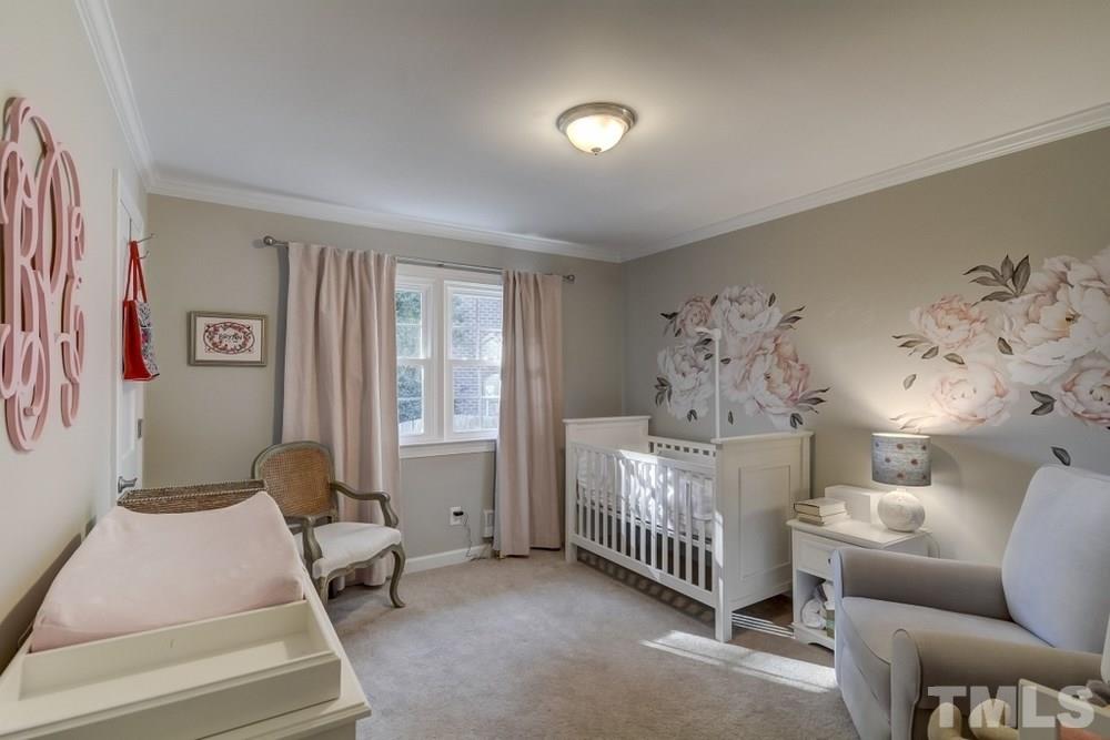 3005 Old Orchard Road Raleigh, NC 27607 - Photo 14 of 21 a bed room with furniture and a window