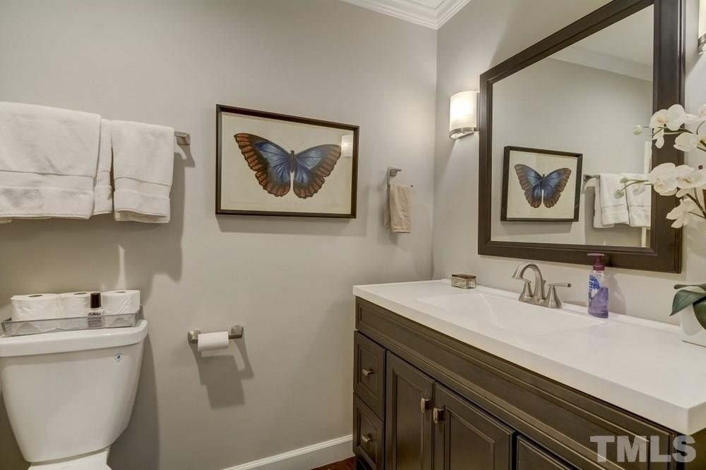 3005 Old Orchard Road Raleigh, NC 27607 - Photo 15 of 21 a bathroom with a sink and a toilet