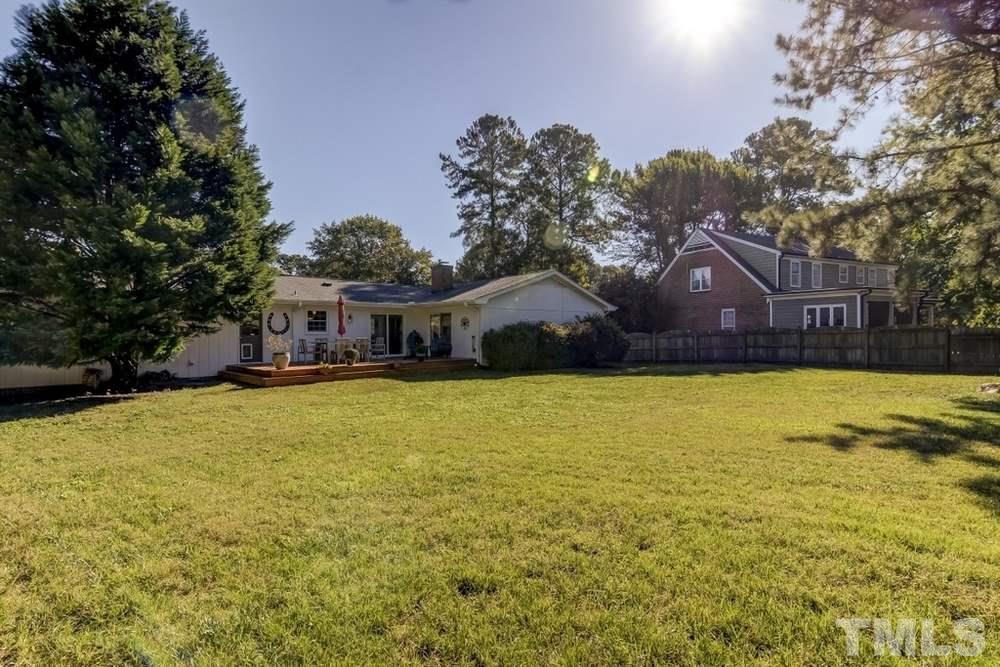 3005 Old Orchard Road Raleigh, NC 27607 - Photo 20 of 21 a front view of house with outdoor space and swimming pool