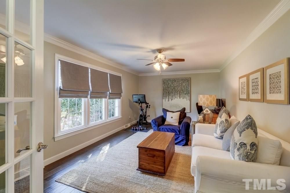 3005 Old Orchard Road Raleigh, NC 27607 - Photo 3 of 21 a living room with furniture and a window