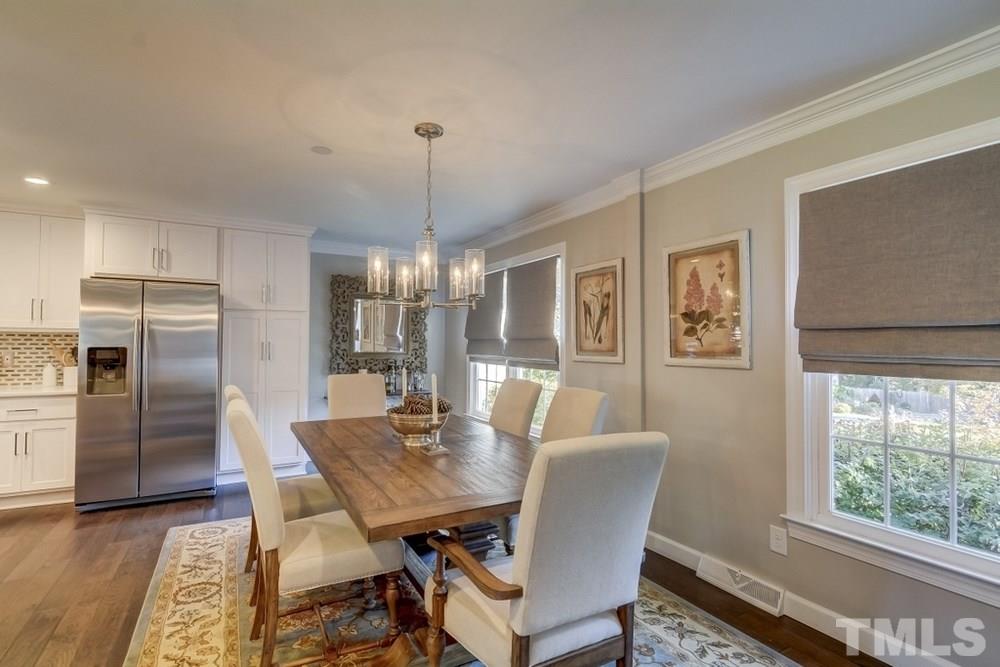 3005 Old Orchard Road Raleigh, NC 27607 - Photo 6 of 21 a view of a dining room with furniture window and outside view