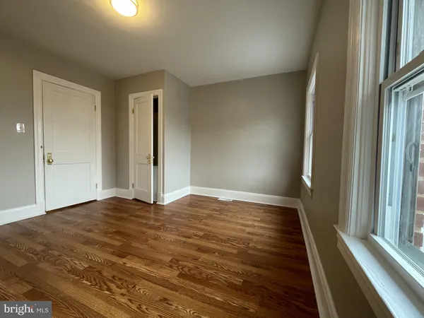 a view of an empty room and window