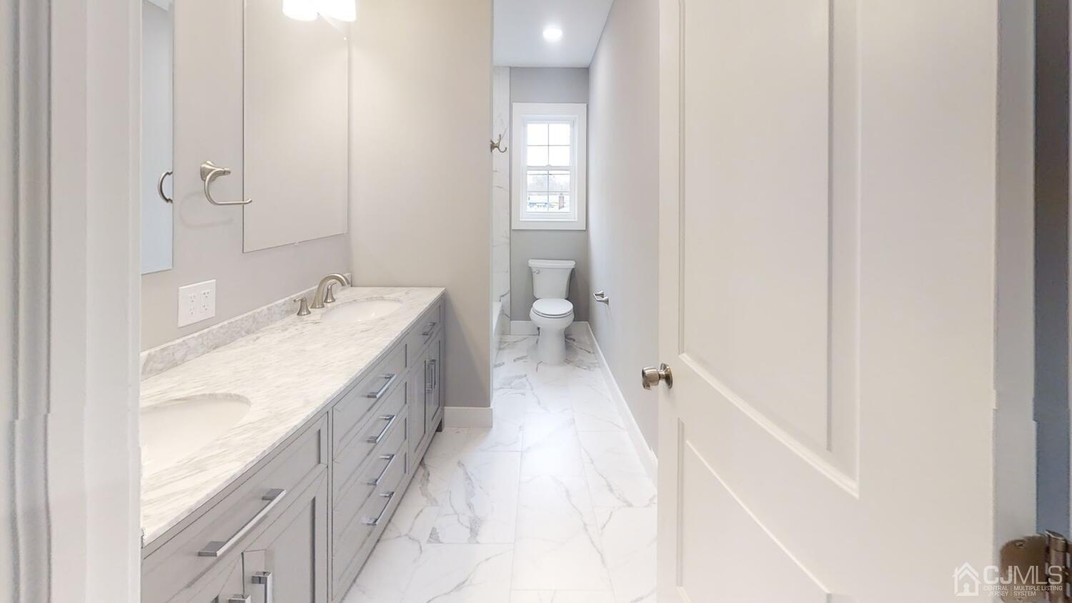 26 Highfield Road Colonia, NJ 07067 - Photo 13 of 30 a spacious bathroom with a granite countertop sink