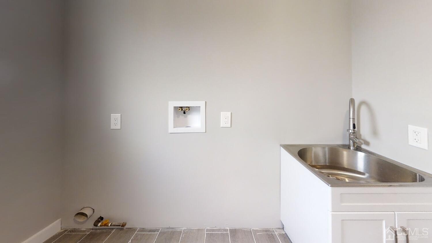 26 Highfield Road Colonia, NJ 07067 - Photo 24 of 30 a kitchen with a sink and cabinets