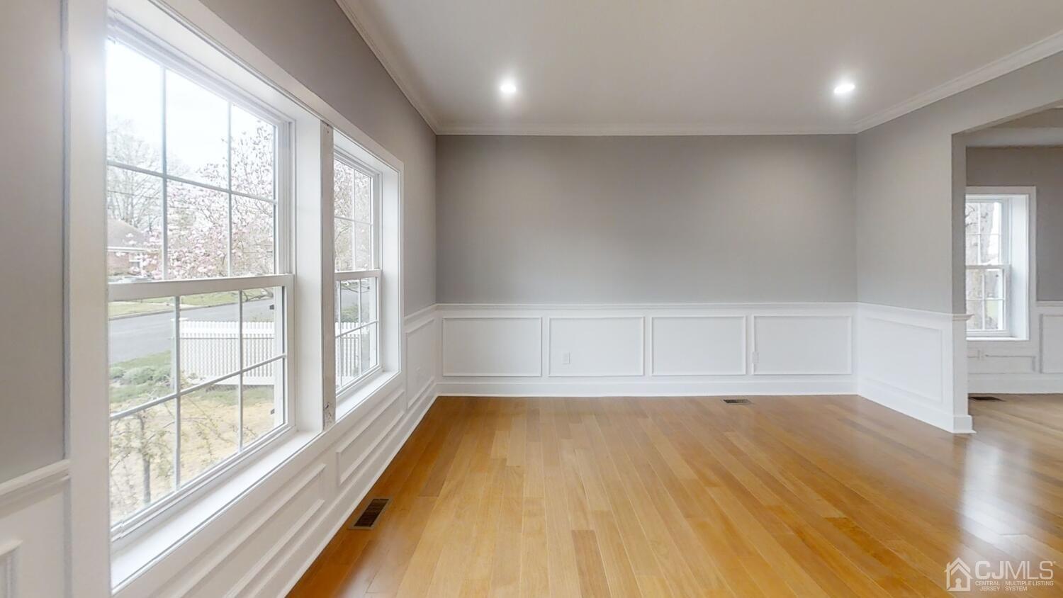 26 Highfield Road Colonia, NJ 07067 - Photo 5 of 30 a view of a room with wooden floor and windows