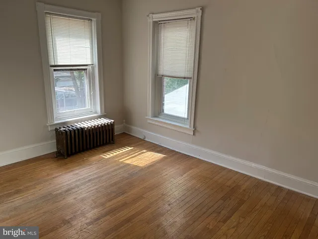 an empty room with window