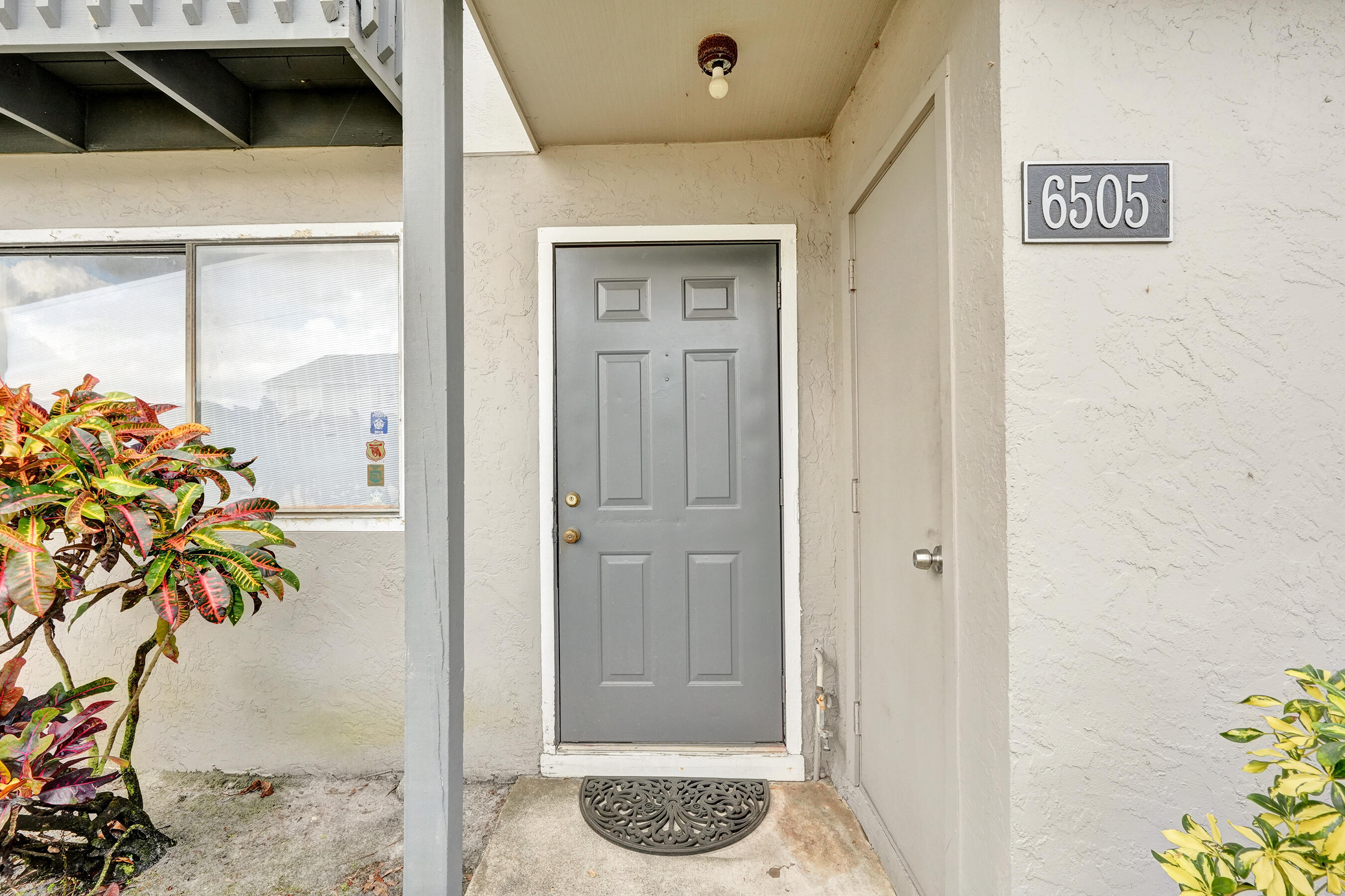 6505 Dockside Circle Greenacres, FL 33463 - Photo 1 of 38 a bathroom with a shower