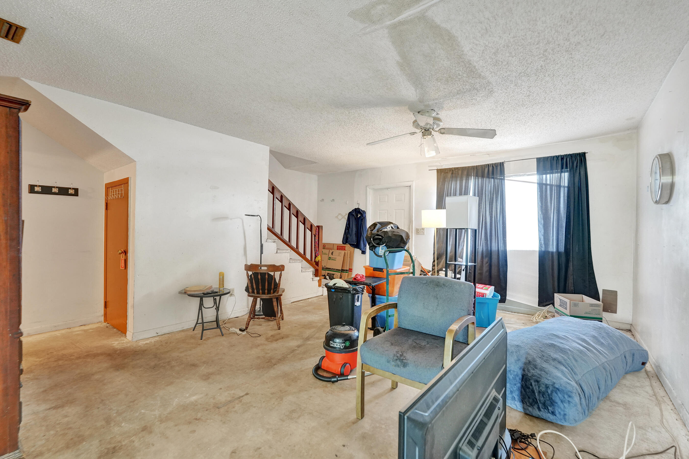 6505 Dockside Circle Greenacres, FL 33463 - Photo 16 of 38 a living room with furniture and a table
